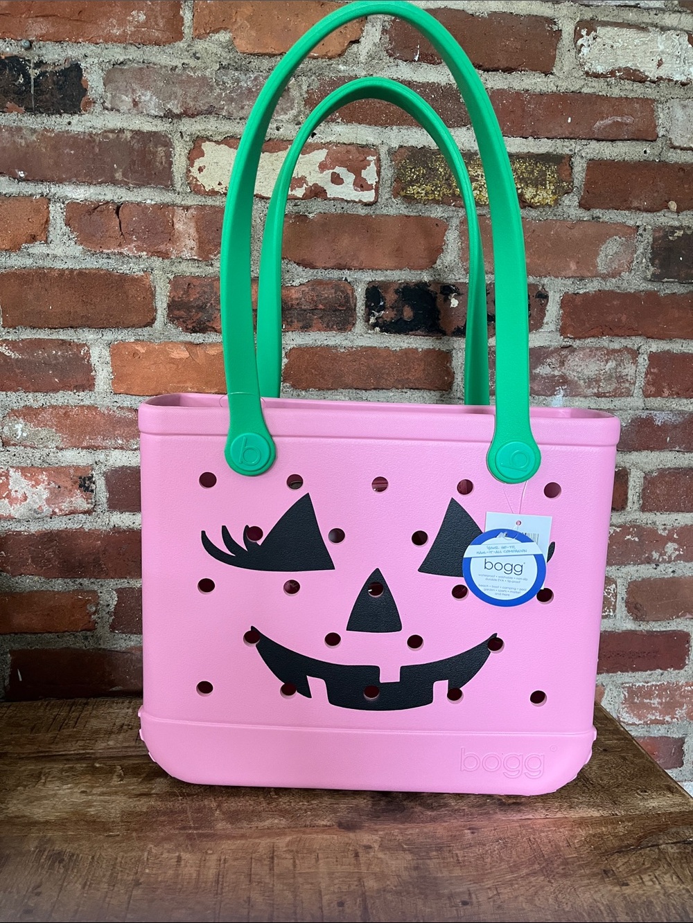 BOGG BAG Pink Tote with Green Handles and Jack-O'-Lantern Face